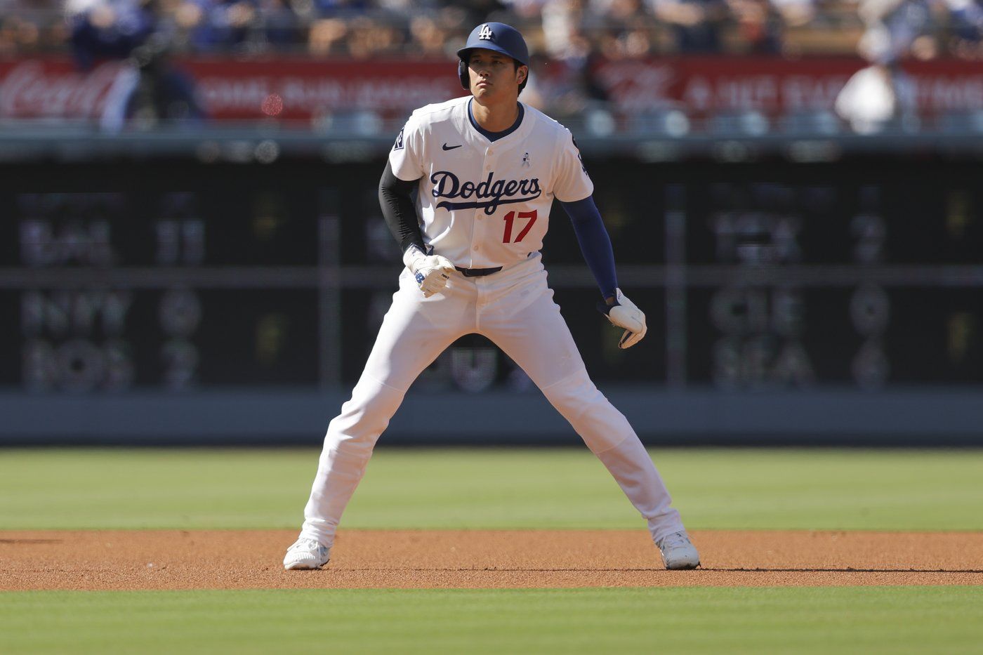 Los Angeles Dodgers designated hitter Shohei Ohtani prepares on base during the first inning of a baseball game against the San Francisco Giants in Los Angeles, Sunday, June 15, 2025. (AP Photo/Jessie Alcheh)