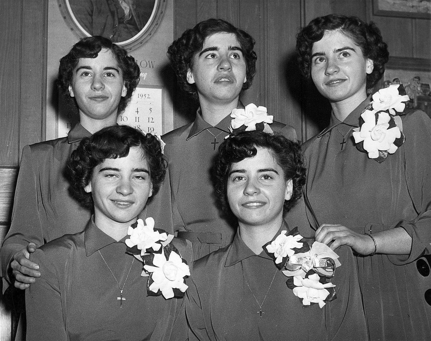 The Dionne quintuplets are shown in a 1952 photo. Front row (left to right) Cecile and Yvonne, and back row (left to right) Marie, Emilie and Annette. THE CANADIAN PRESS/CP
